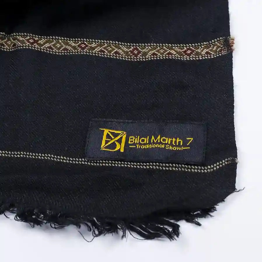 Men wearing traditional black shawl with shalwar kameez