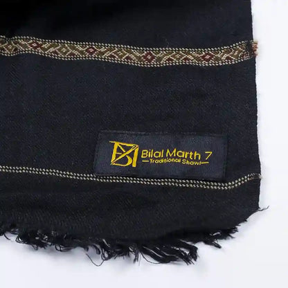 Men wearing traditional black shawl with shalwar kameez